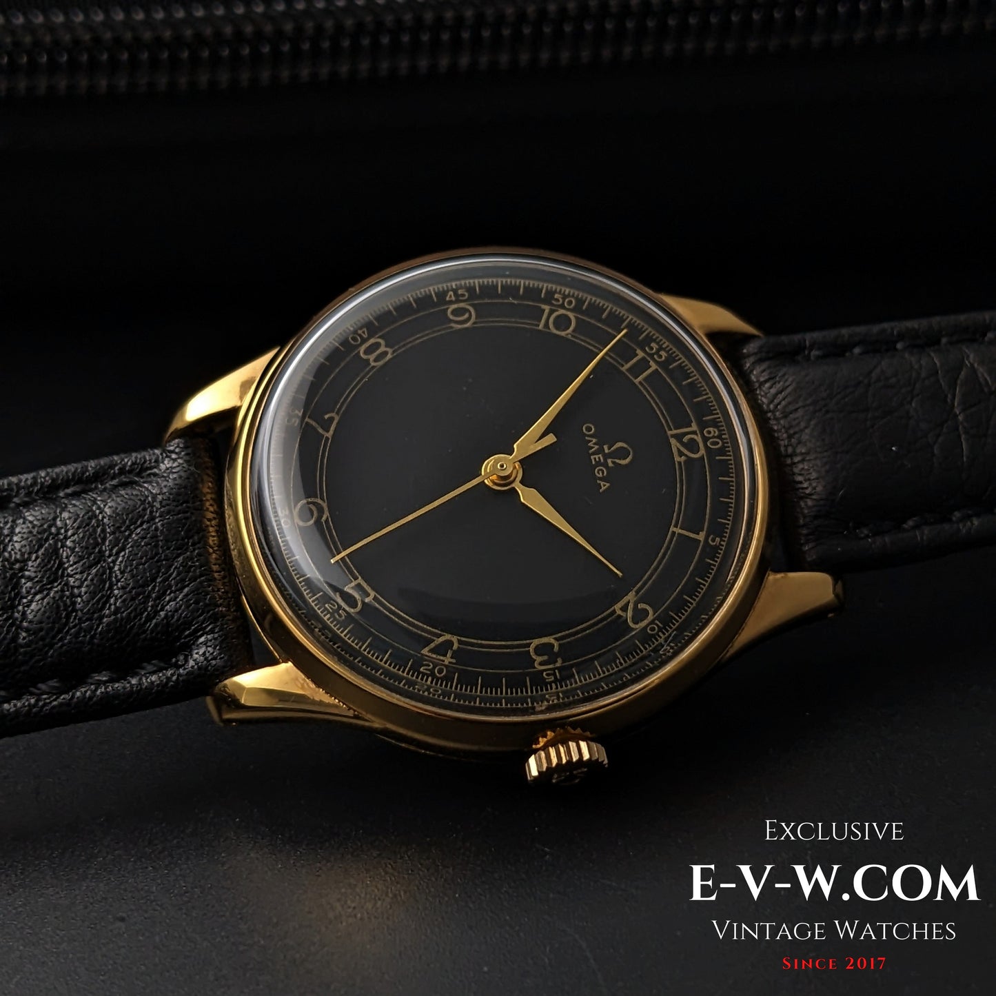 Vintage Omega WWII Gold Watch 1944 featuring black sector dial and gold-plated case, a rare collectible for horology enthusiasts.