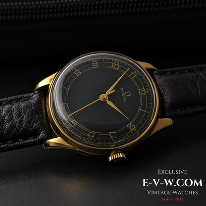 Vintage Omega WWII Gold Watch 1944 featuring black sector dial and gold-plated case, a rare collectible for horology enthusiasts.