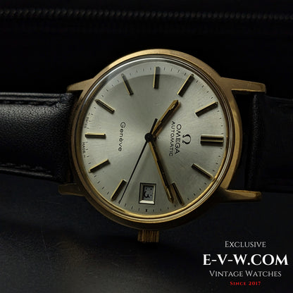 Omega Geneve 1973 Watch Ref. 1660163 with gold case and silver dial, displayed against black background for a luxury vintage appeal.
