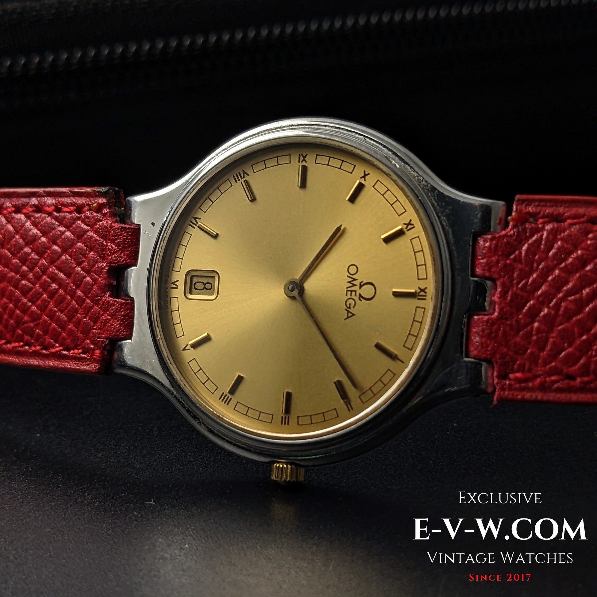 Side angle of Omega vintage 24-hour dial watch with gold-tone dial and red strap, Ref. 3961016, ideal for collectors.