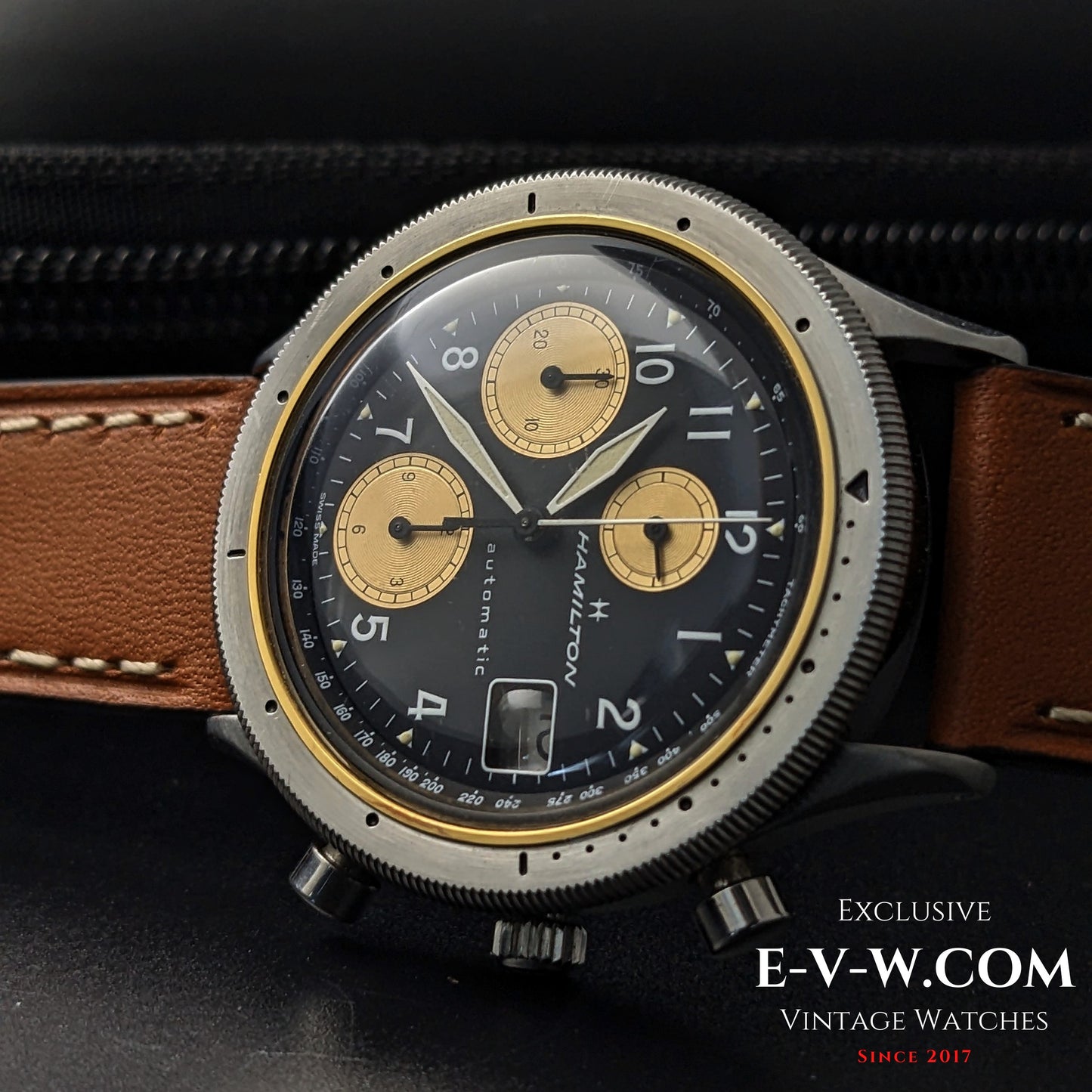 Close-up of Vintage Hamilton Automatic Chronograph for Collectors with gold subdials and date window, highlighting its Swiss-made precision.