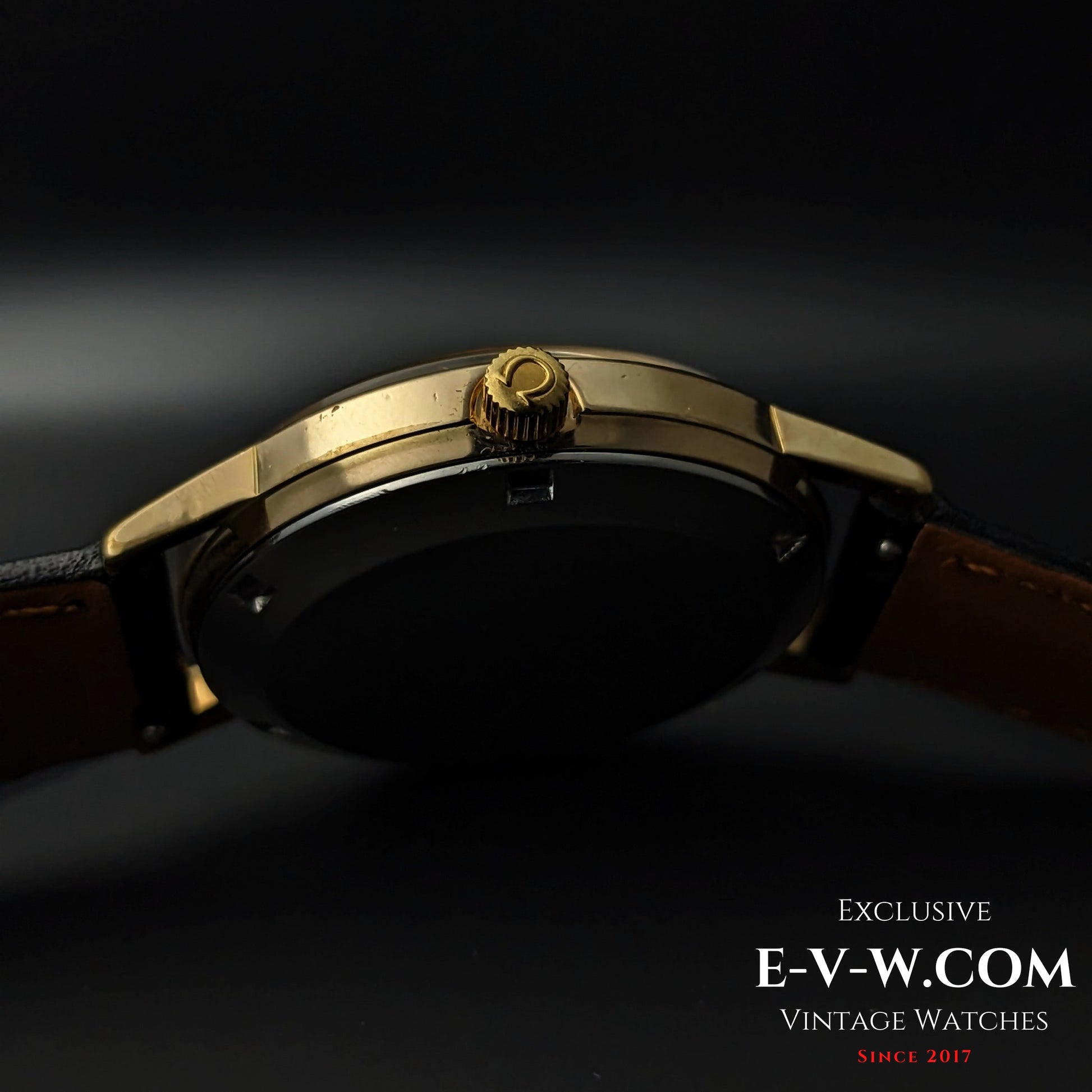 Side profile of Omega Geneve 1973 Watch Ref. 1660163 showing gold crown and slim case design, ideal for formal wear.