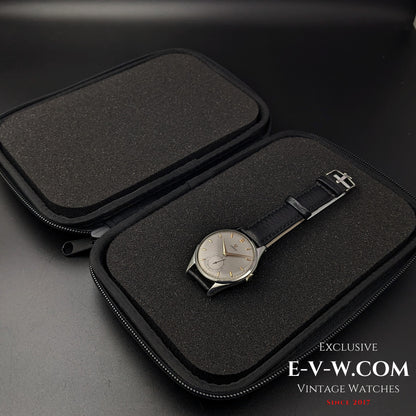 Omega Jumbo 38mm Ref. 2505 20 wristwatch placed inside a protective black travel case, ensuring safe storage for this vintage timepiece.