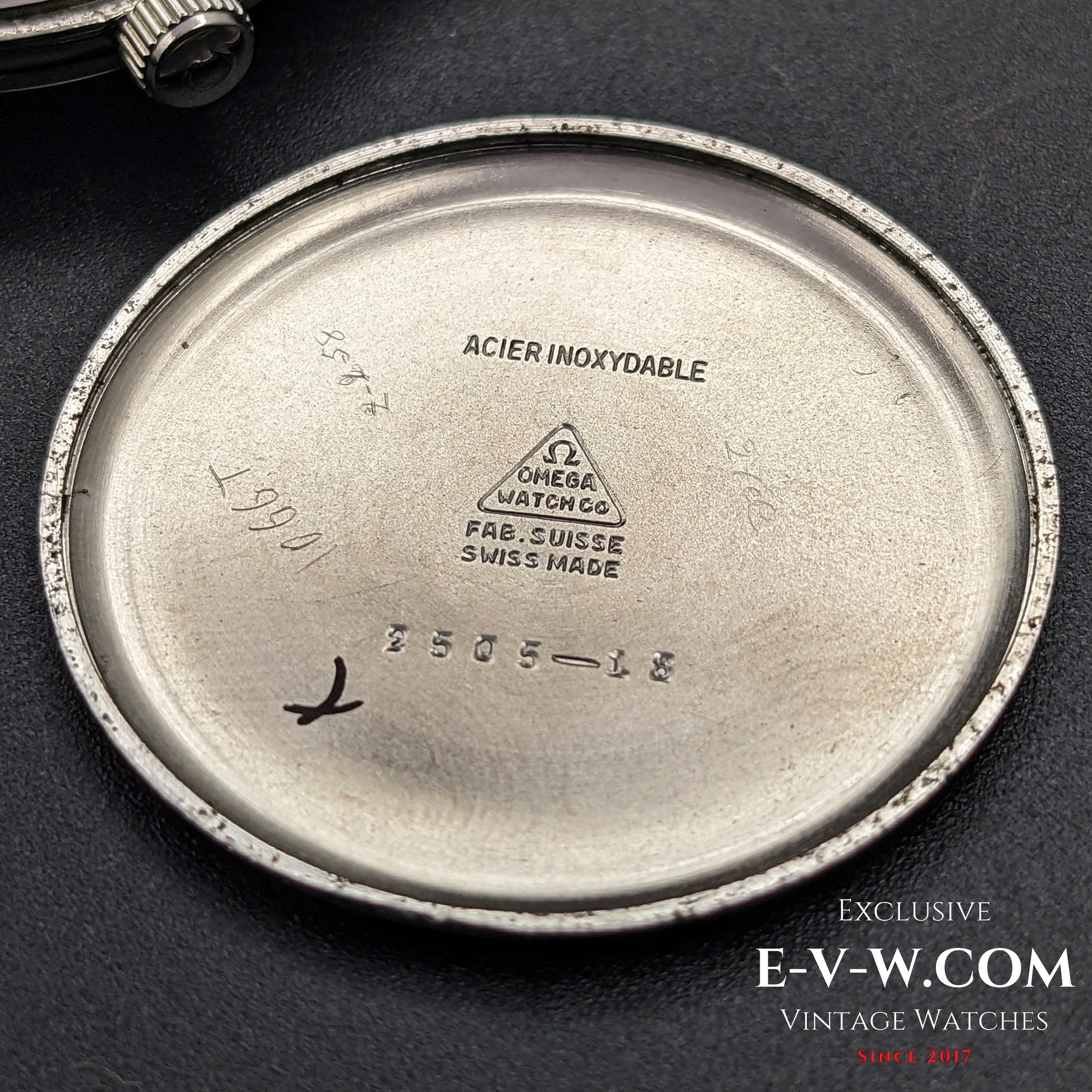 Inside case back of Omega Vintage 1952 Jumbo Ref. 2505 wristwatch, engraved with Swiss-made markings and reference number.
