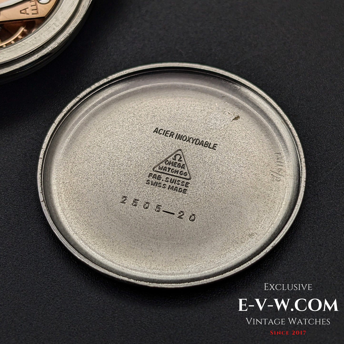 Inside case back of Omega Jumbo 38mm Ref. 2505 20, engraved with Omega branding and reference number, confirming its authenticity.