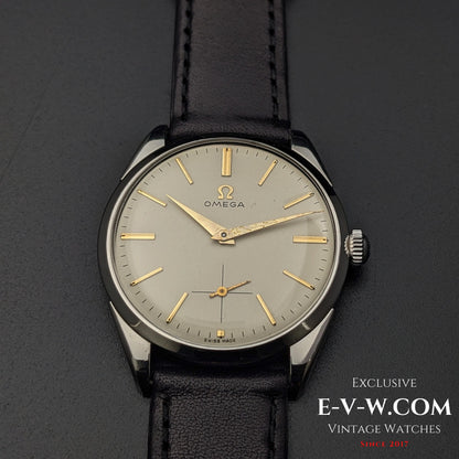 Front view of Omega CK 2900 Vintage 1956 watch, highlighting its champagne dial, gold-tone hands, and sub-seconds dial. A rare collector's item.
