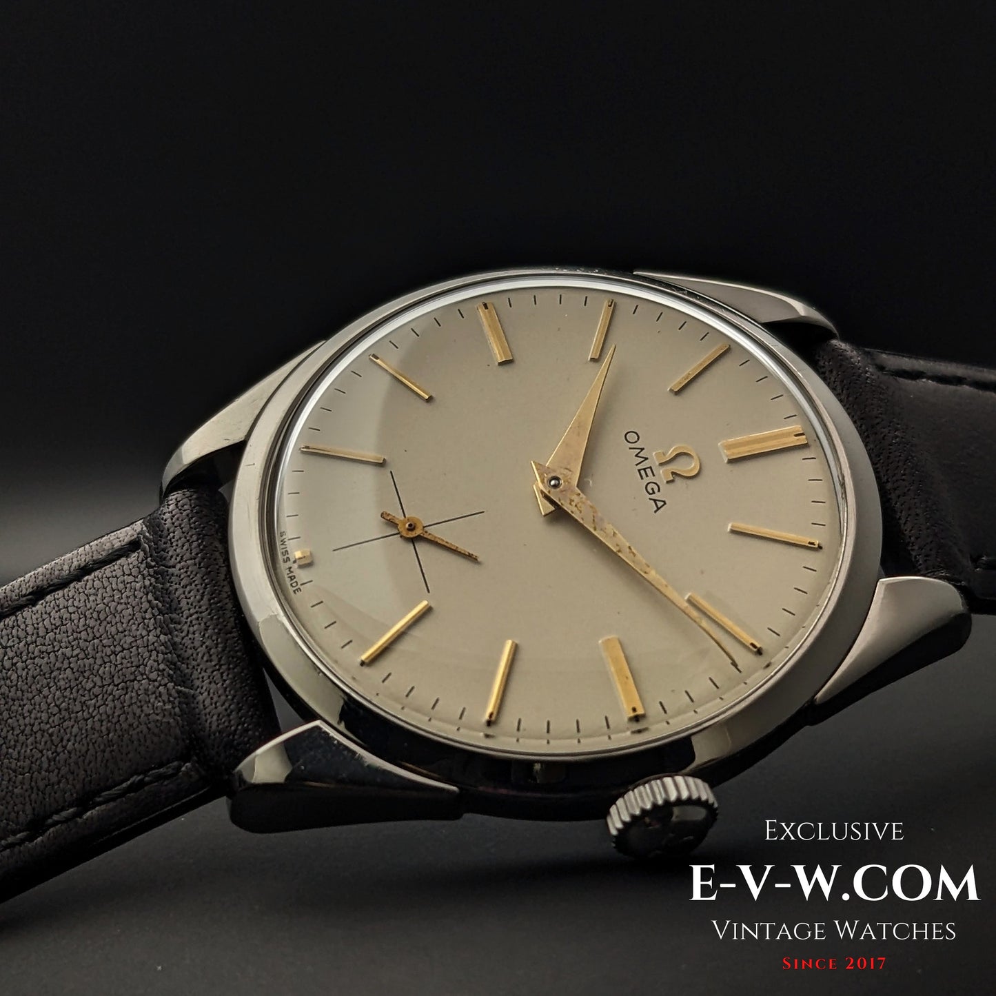 Close-up angled view of Omega CK 2900 Vintage 1956 watch, showcasing its elegant dial, gold-tone indices, and rare Cal. 267 movement.