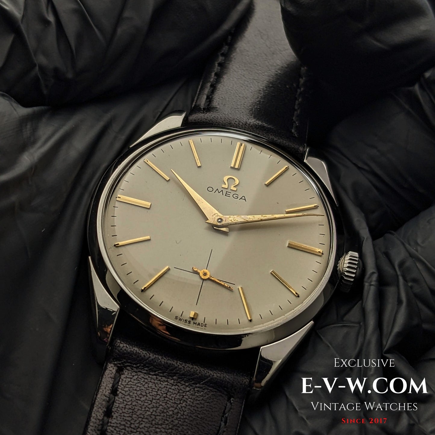 Omega CK 2900 Vintage 1956 watch with rare Cal. 267 movement, featuring a champagne dial and gold-tone indices. A timeless collectible for enthusiasts.