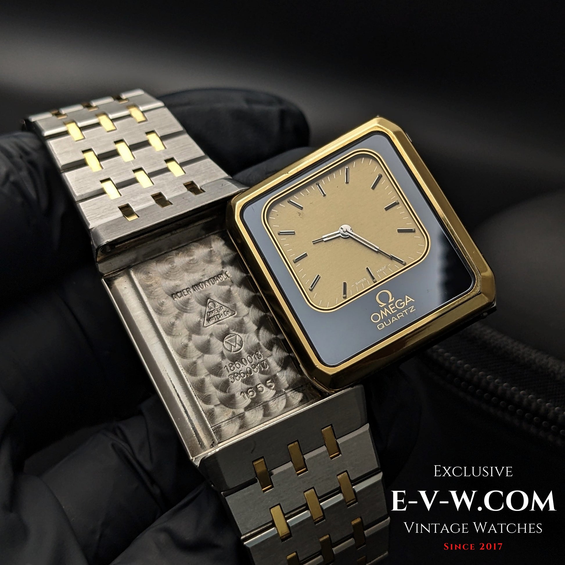 1982 Omega Equinoxe Watch - Vintage Precision with gold-tone square dial and reversible case showing Cal. 1655 movement, ideal for collectors.