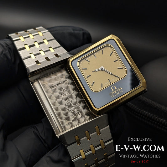 1982 Omega Equinoxe Watch - Vintage Precision with gold-tone square dial and reversible case showing Cal. 1655 movement, ideal for collectors.