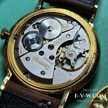 Montre habillée Eberhard &amp; Co en or 18 carats des années 1960 | Rare indicateur de date à roulette | Cal. 236-129 |