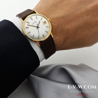 Montre habillée Eberhard &amp; Co en or 18 carats des années 1960 | Rare indicateur de date à roulette | Cal. 236-129 |