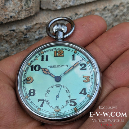 Jaeger-LeCoultre WWII Military Watch Cal. 467 Vintage 1940 shown in hand, featuring a mint green dial and sub-seconds at 6 o'clock.