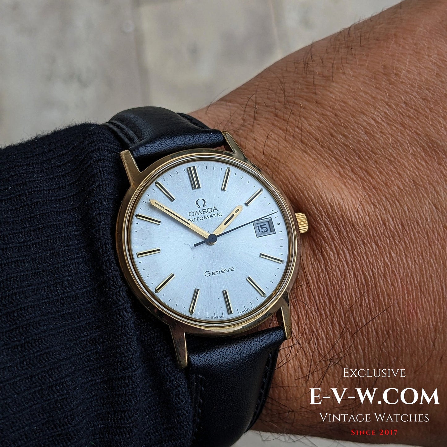 Vintage Omega Geneve 1973 Watch Ref. 1660163 worn on wrist, featuring gold case, silver dial, and date window, ideal for classic men's style.