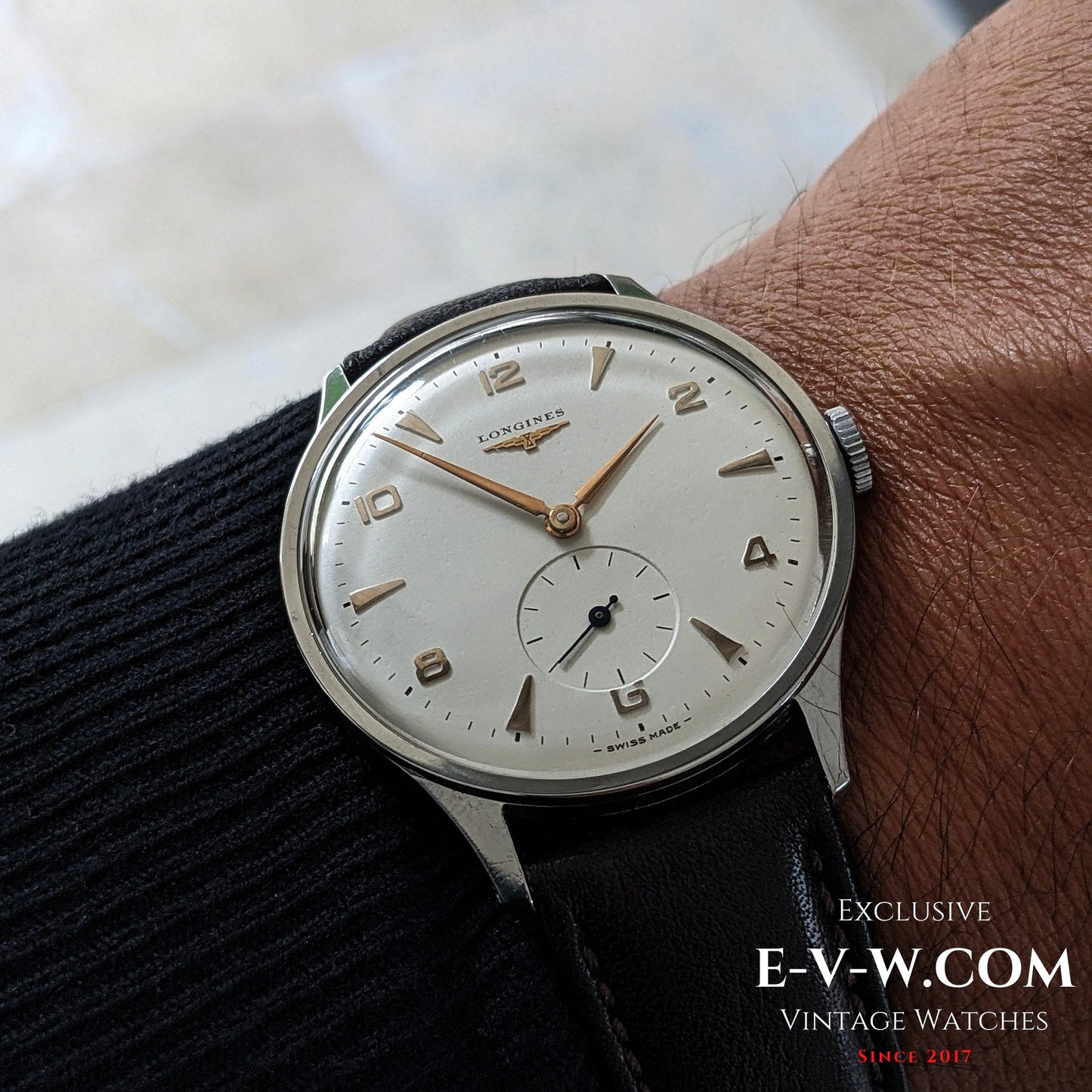 1955 Longines Jumbo Calatrava Ref 2849 vintage watch worn on wrist, showcasing its elegant silver dial and classic Swiss design.