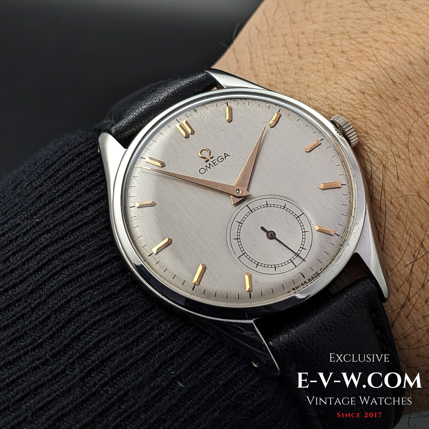 Omega Jumbo 38mm Ref. 2505 20 wristwatch worn on wrist, showcasing its elegant silver dial, gold-tone hands, and vintage appeal from 1950.