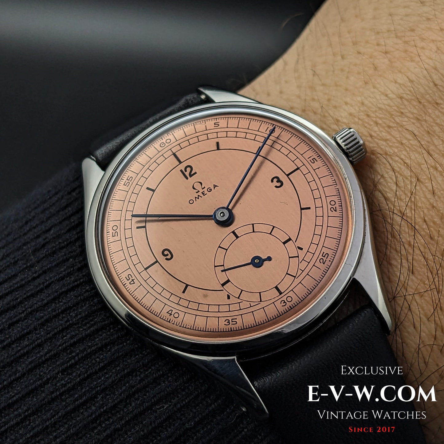 72-year-old Omega Jumbo Ref. 2505 wristwatch worn on wrist, featuring a salmon sector dial and manual-wind Cal. 266 movement.