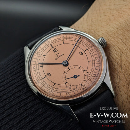 72-year-old Omega Jumbo Ref. 2505 wristwatch worn on wrist, featuring a salmon sector dial and manual-wind Cal. 266 movement.