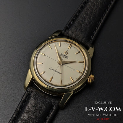 Front view of 67-Year-Old Omega Seamaster Ref. 2828-9SC Cal. 471 with cream dial, gold markers, and black leather strap.