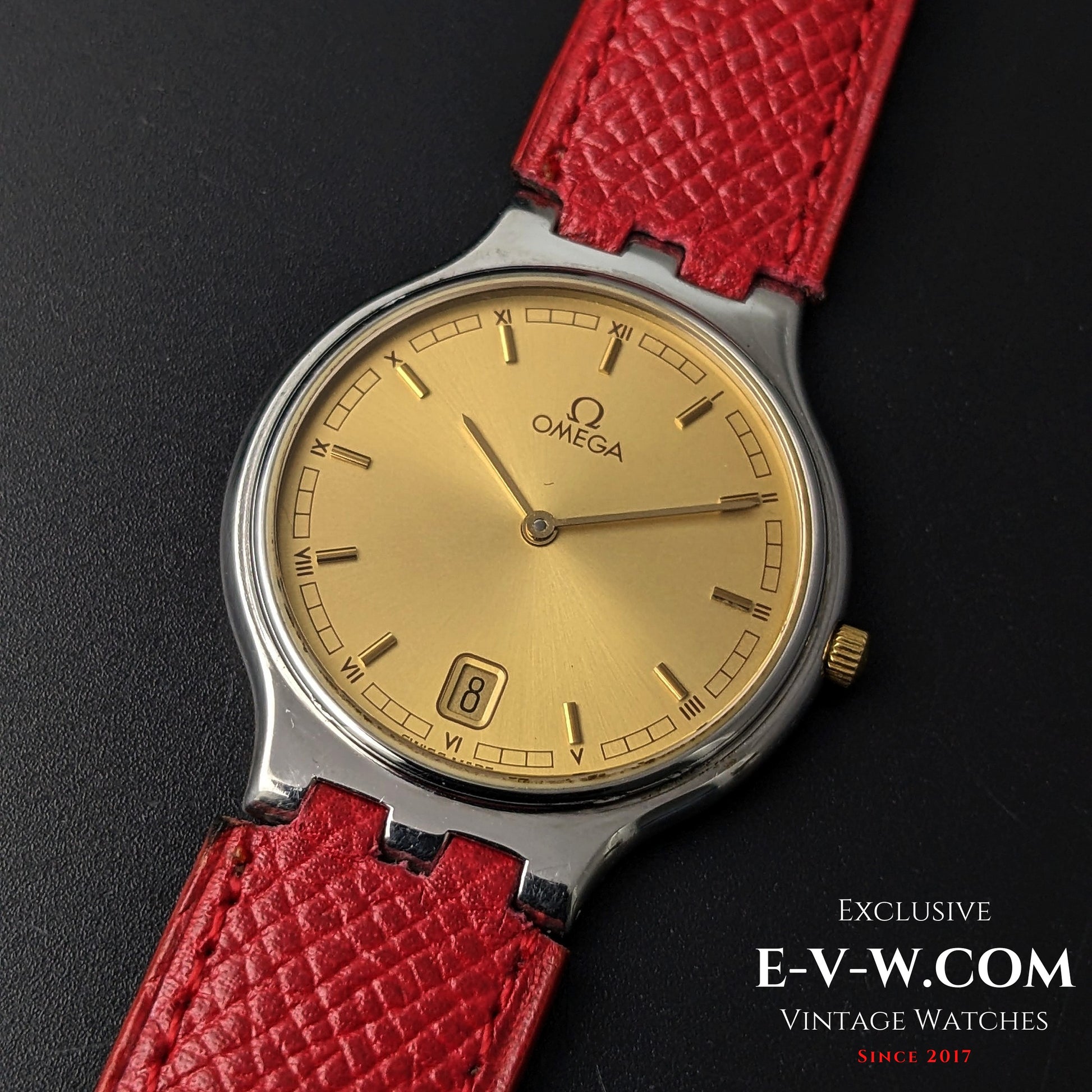 Front view of Omega vintage 24-hour dial watch with gold dial and red strap, Ref. 3961016, classic men's timepiece.