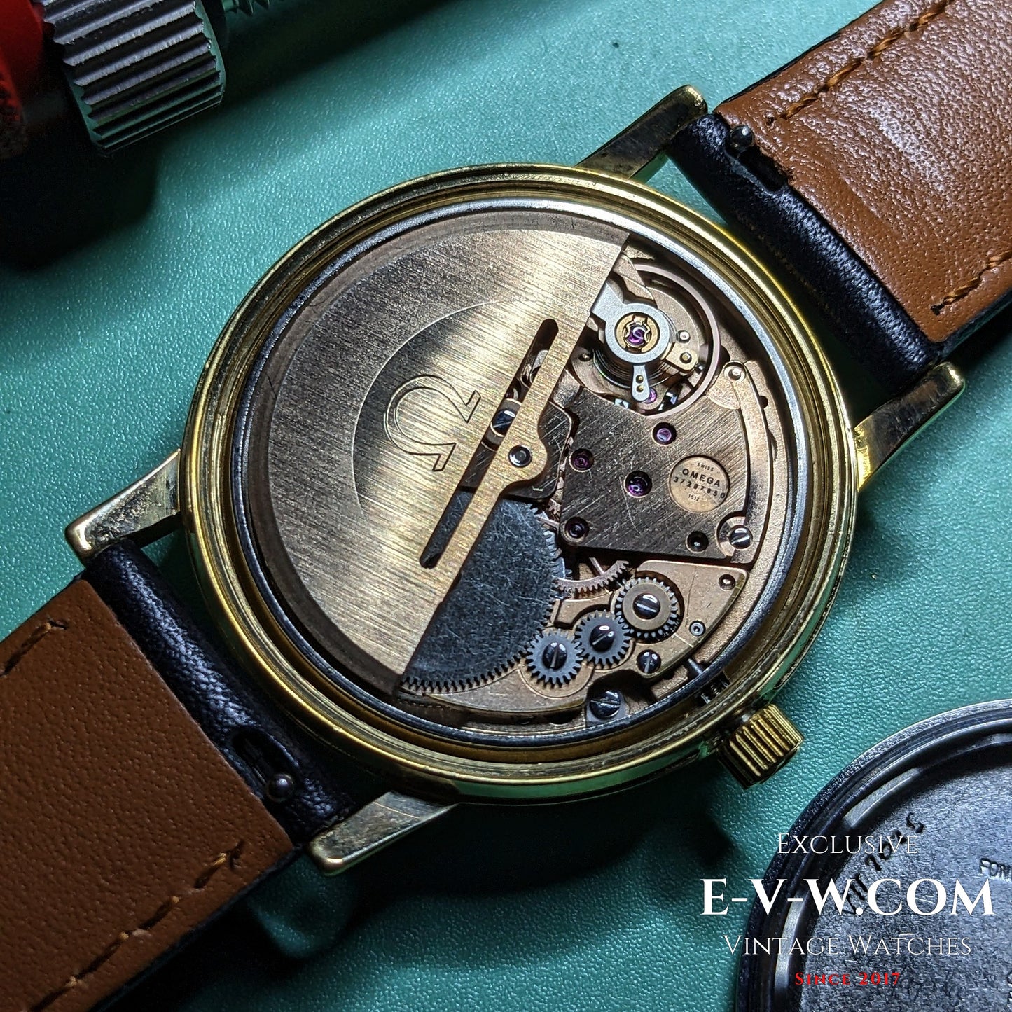 Detailed view of Omega Caliber 1012 movement inside Vintage Omega Geneve 1973 Watch Ref. 1660163, showcasing Swiss mechanical precision.