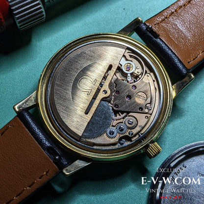 Detailed view of Omega Caliber 1012 movement inside Vintage Omega Geneve 1973 Watch Ref. 1660163, showcasing Swiss mechanical precision.