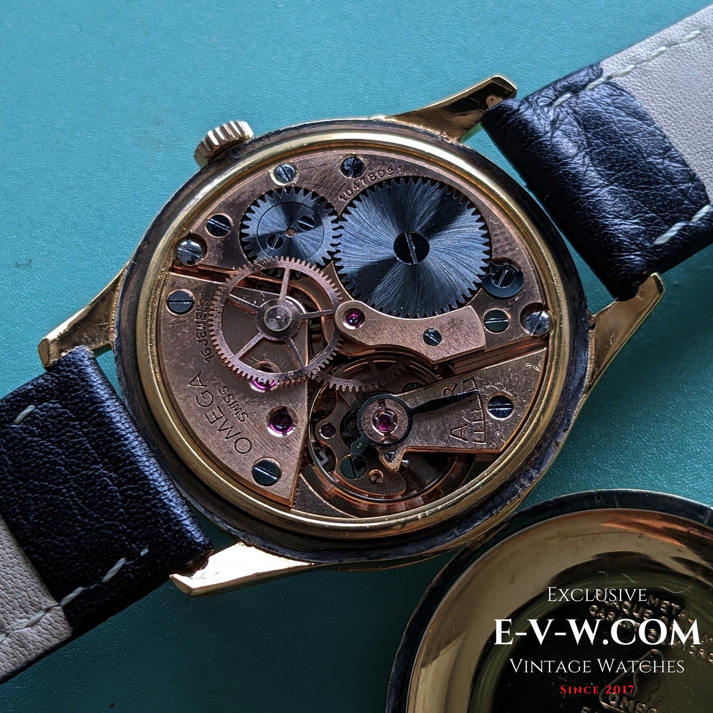 Detailed view of Omega Cal. 30T2 SCPC movement inside 1944 Vintage Omega WWII Gold Watch, highlighting intricate mechanical craftsmanship.