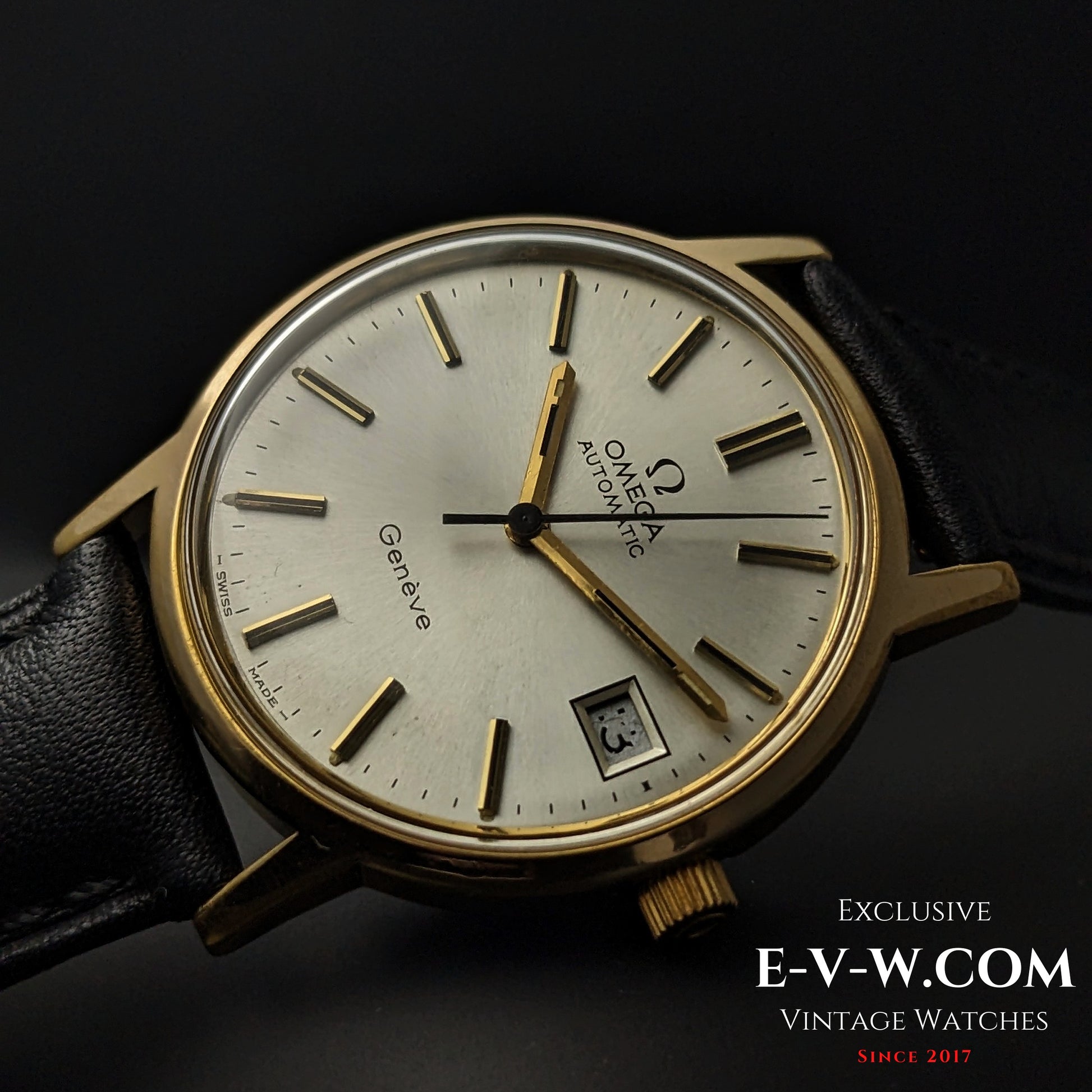 Omega Geneve 1973 Watch Ref. 1660163 close-up with date display and gold-tone hands, highlighting vintage Swiss design.