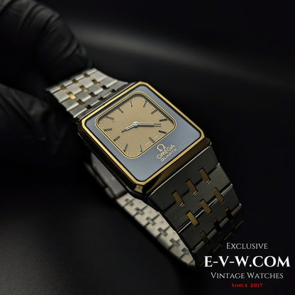 Angled view of 1982 Omega Equinoxe Watch - Vintage Precision with gold-tone analog dial and two-tone bracelet, highlighting retro elegance.