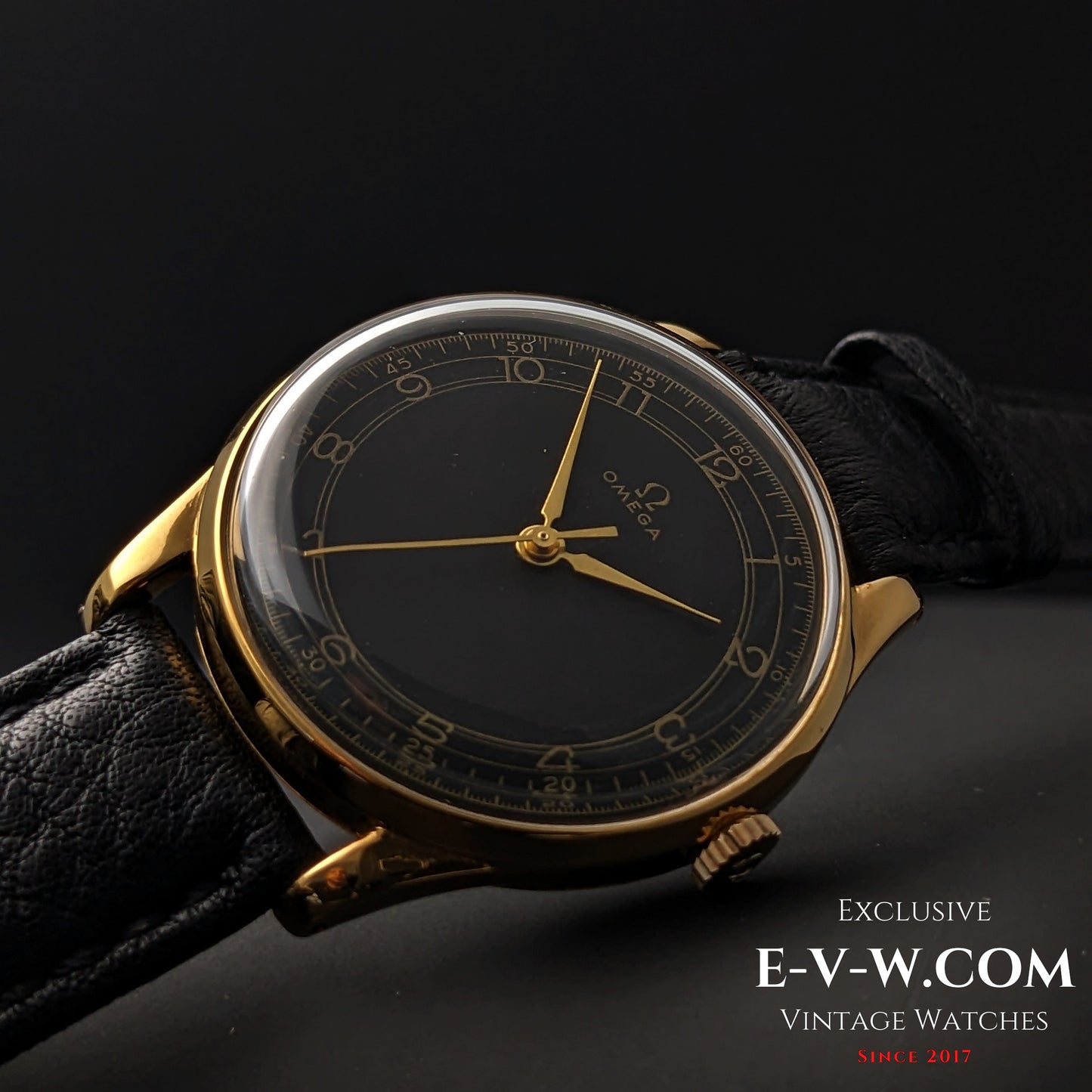 Side angle of 1944 Vintage Omega WWII Gold Watch with domed crystal and black dial, emphasizing its classic gold-plated case design.