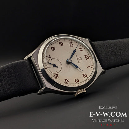 Side view of the 89-year-old Omega Art Deco wristwatch, highlighting its vintage steel case, domed crystal, and elegant design from 1935.