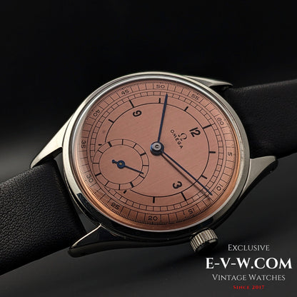 Omega Vintage 1952 Jumbo Ref. 2505 wristwatch with salmon sector dial, featuring a steel case and black leather strap.