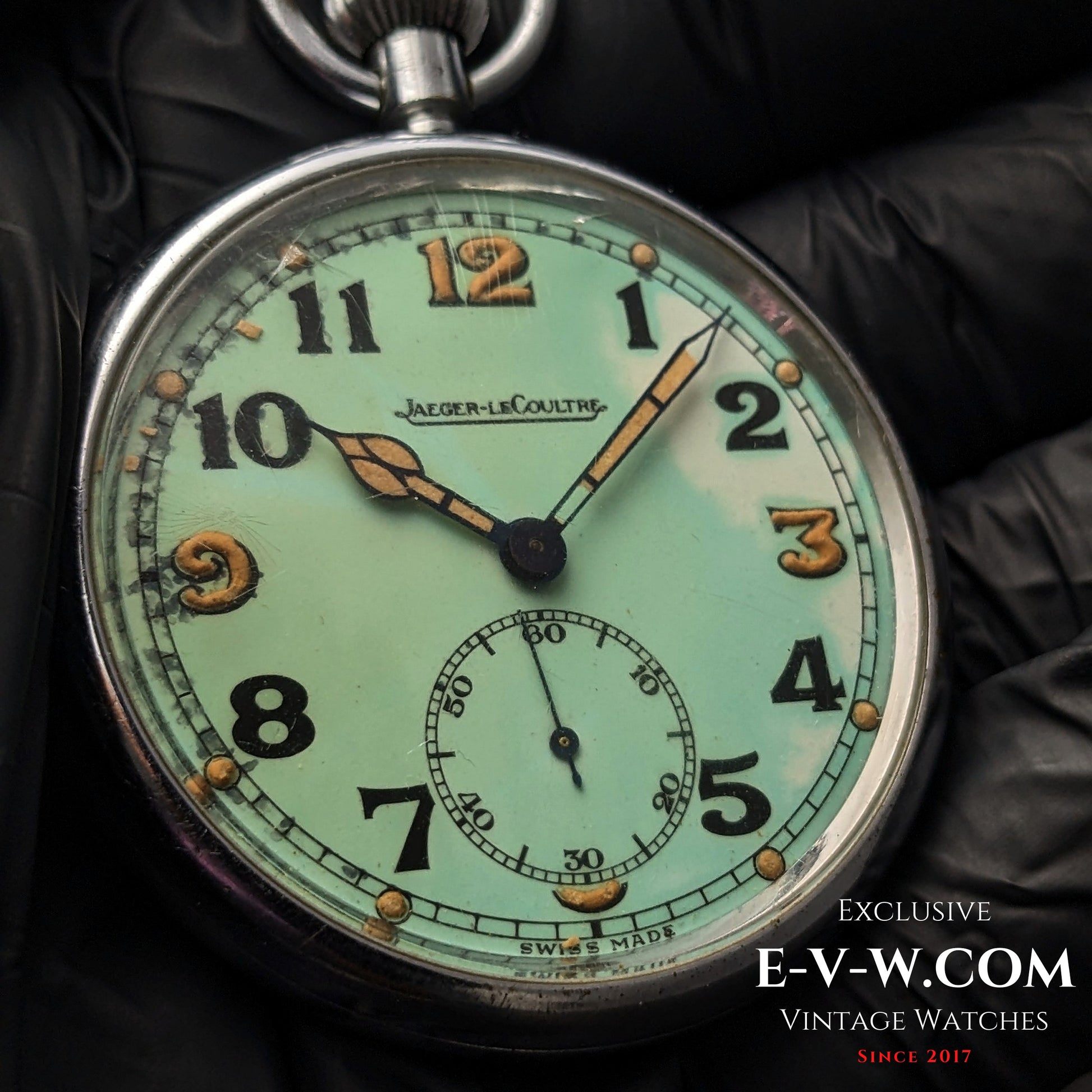 Detailed view of Jaeger-LeCoultre WWII Military Watch Cal. 467 Vintage 1940 dial with patina and aged luminous hands.