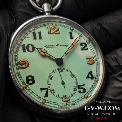 Detailed view of Jaeger-LeCoultre WWII Military Watch Cal. 467 Vintage 1940 dial with patina and aged luminous hands.
