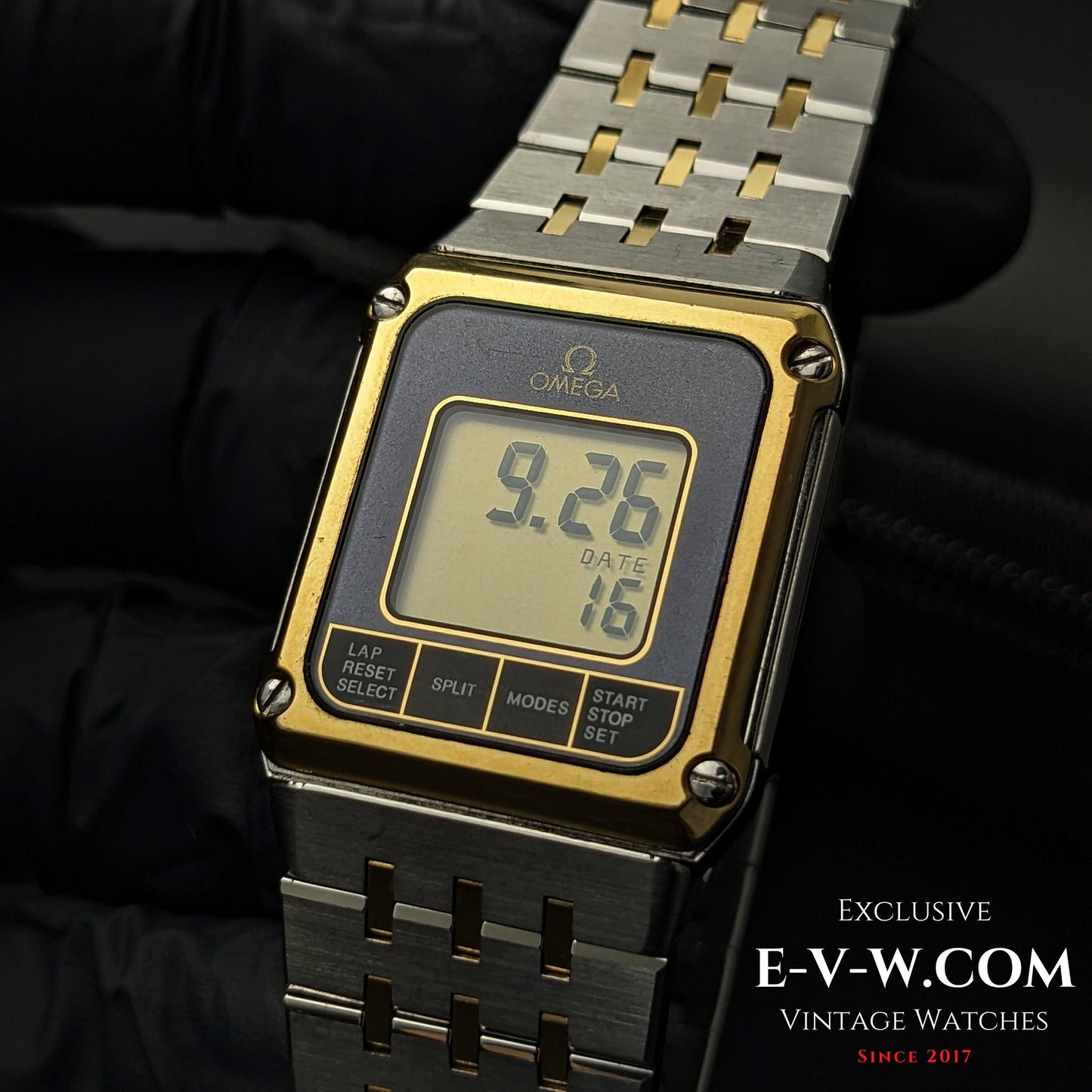 Digital face of 1982 Omega Equinoxe Watch - Vintage Precision showing time and date with functional buttons, perfect for vintage tech lovers.