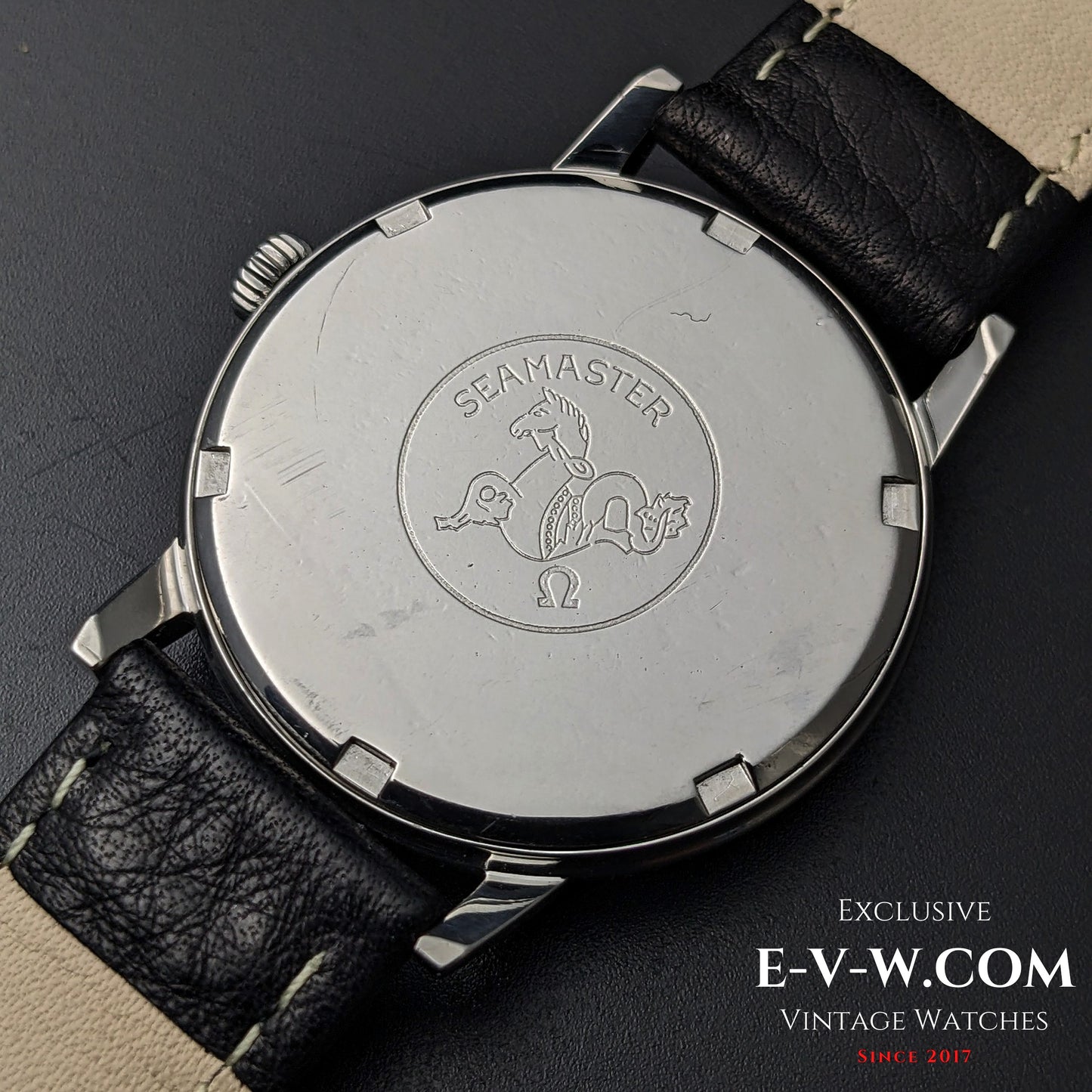 Case back of Vintage Omega Seamaster 600 1966 Ref. 135011 engraved with Seamaster logo and Omega symbol, stainless steel finish.