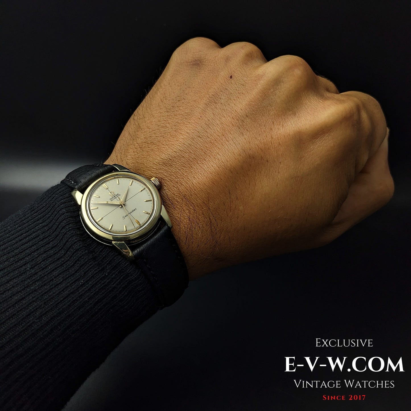 Omega Seamaster Ref. 2828-9SC Cal. 471 worn on wrist, showcasing its classic 1958 design with gold-tone case and black leather strap.