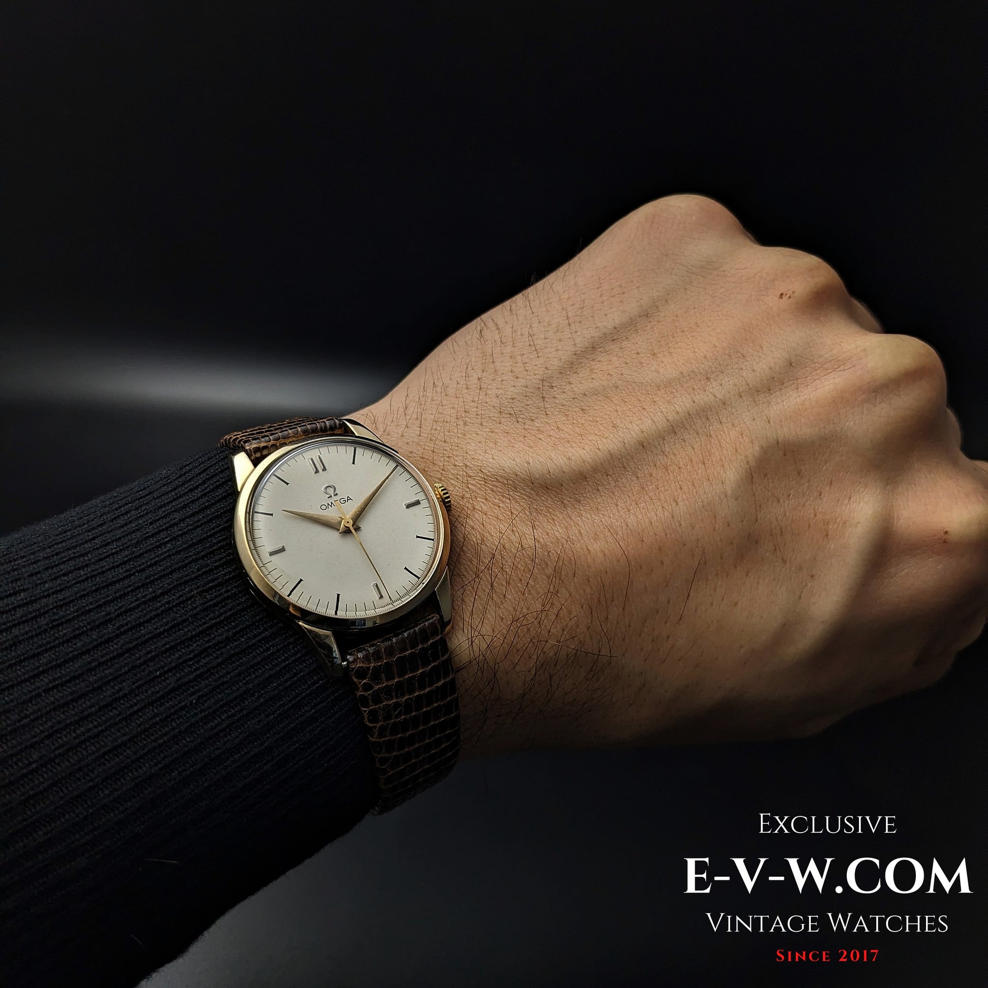 Vintage Omega Classic Gold Plaque watch worn on wrist, displaying its refined design and historical significance from 1952.