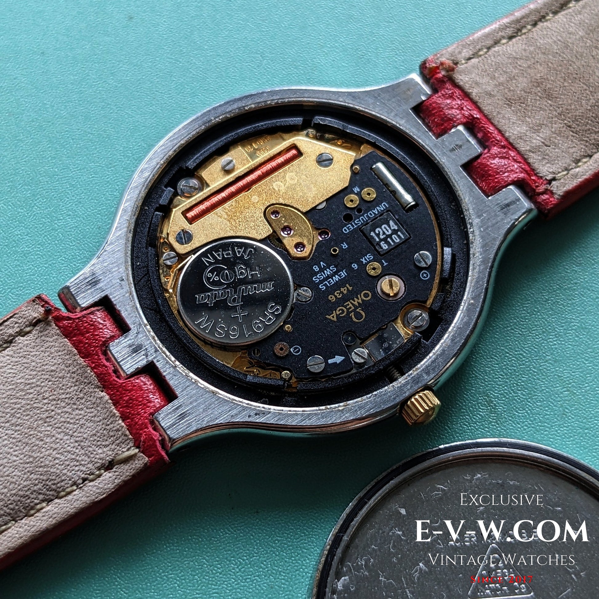 Internal view of Omega Ref. 3961016 showing Cal. 1436 quartz movement with Japan parts, highlighting vintage craftsmanship.