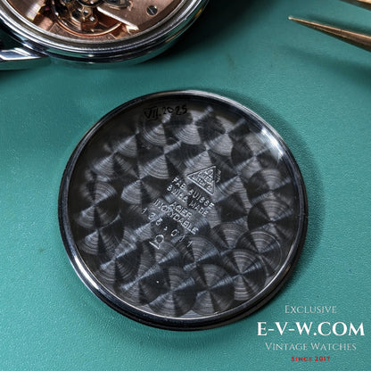 Inside case back of Vintage Omega Seamaster 600 1966 Ref. 135011 showing Swiss hallmark, reference number, and brushed metal finish.