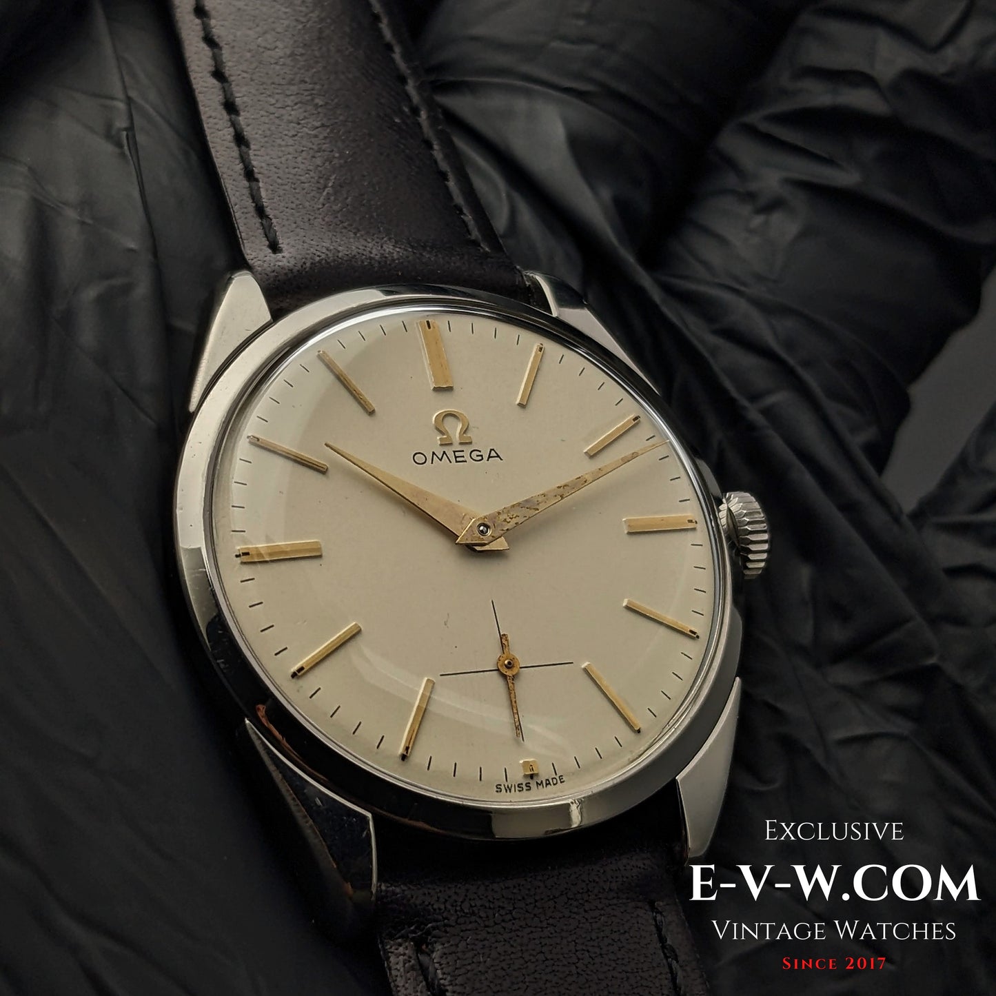 Omega CK 2900 Vintage 1956 watch held in gloved hands, showcasing its pristine condition and rare Cal. 267 movement. A true collector's item.