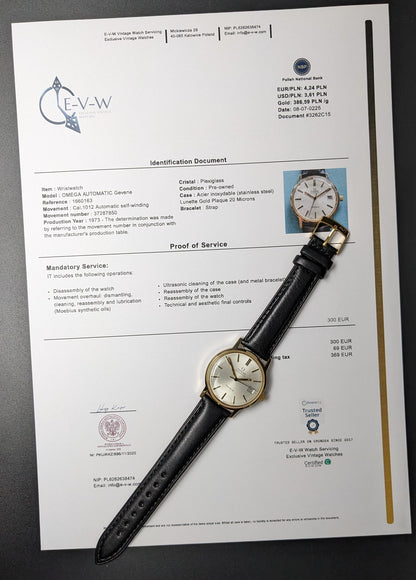 Omega Geneve 1973 Watch Ref. 1660163 displayed with official service documentation and black leather strap, highlighting authenticity and condition.