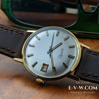 Montre habillée Eberhard &amp; Co en or 18 carats des années 1960 | Rare indicateur de date à roulette | Cal. 236-129 |