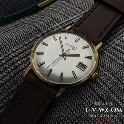 Montre habillée Eberhard &amp; Co en or 18 carats des années 1960 | Rare indicateur de date à roulette | Cal. 236-129 |